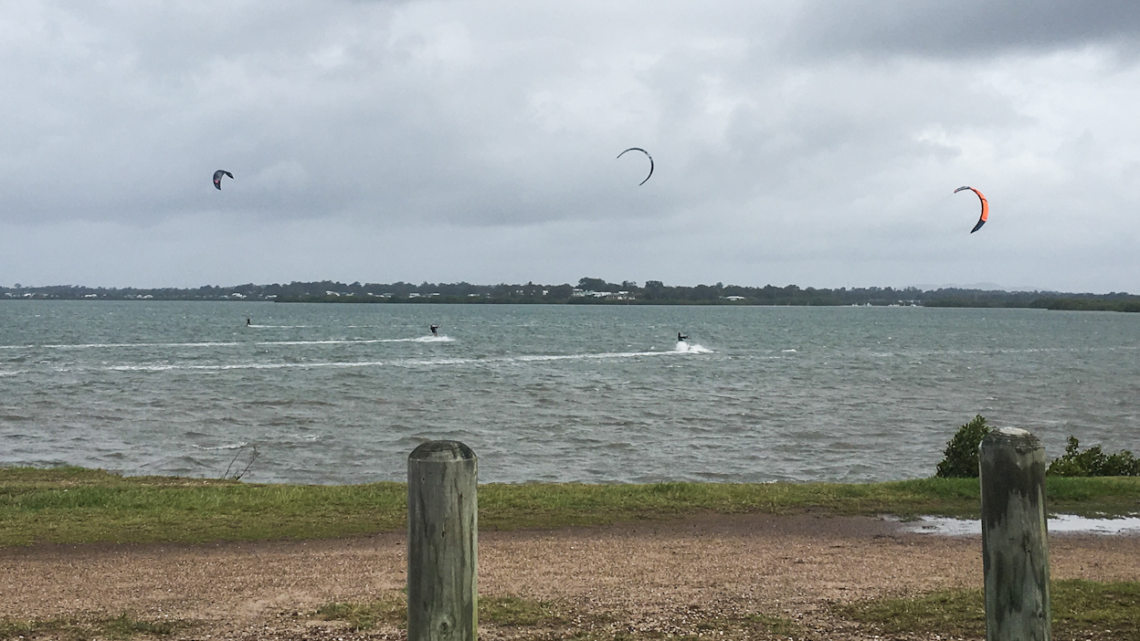 Kite Surfers making the most of their Monday at Lota Brisbane Bayside