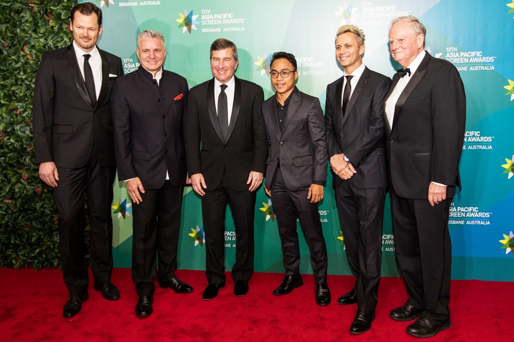 Suited up men on the Red Carpet for the Asia Pacific Screen Awards held in Brisbane