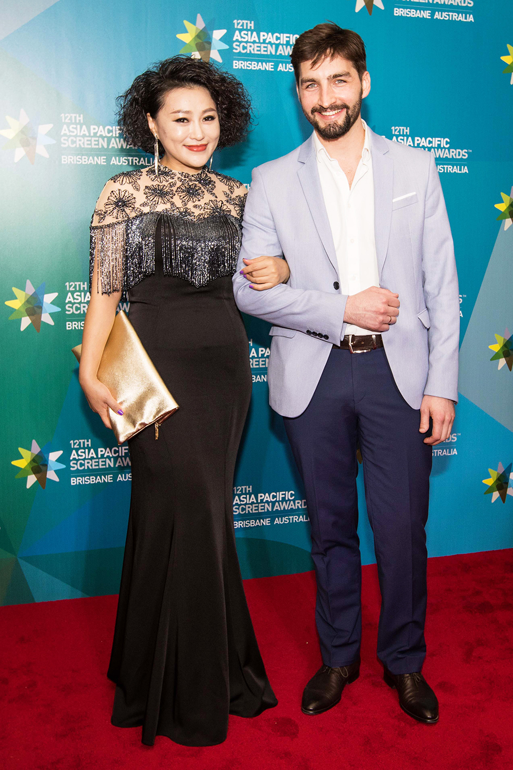 Asia Pacific Screen Awards guests walking the Red Carpet at the Brisbane Exhibition and Convention Centre 